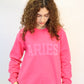 Pink Zodiac Puff Print Crewneck